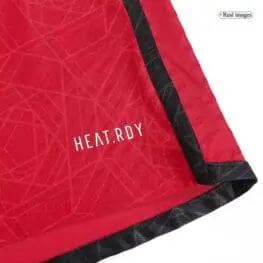 a red and black cloth with white text