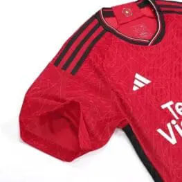 a red shirt with black stripes
