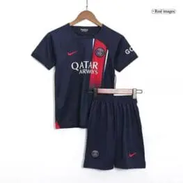 a blue sports uniform and shorts on a swinger