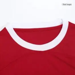 a red shirt with white trim