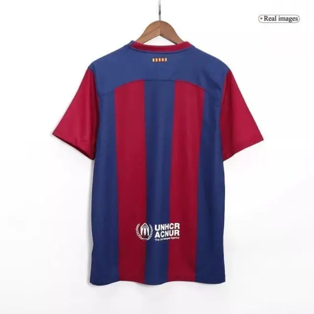 a red and blue striped shirt on a swinger