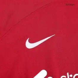 a red shirt with a white swoosh