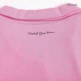 a close up of a pink shirt