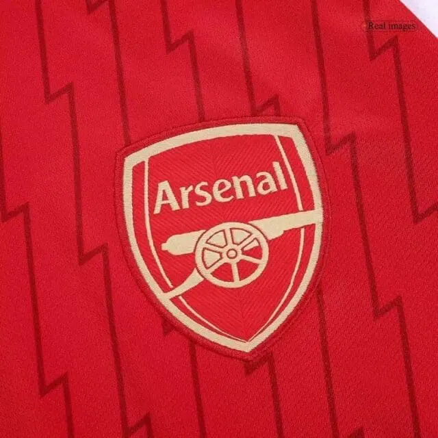 a red and white sports jersey with a logo