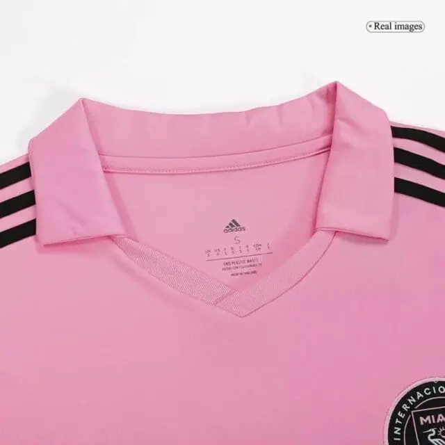 a pink shirt with black stripes