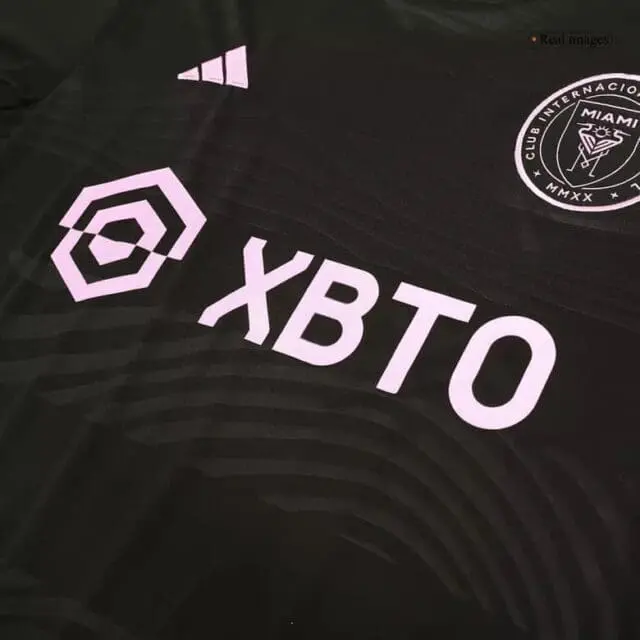 a black jersey with white text