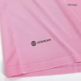 a pink shirt with a logo on it