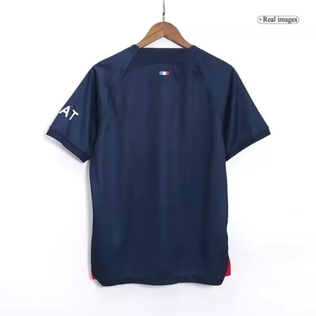 a blue shirt on a swinger
