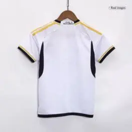 a white and black shirt on a swinger
