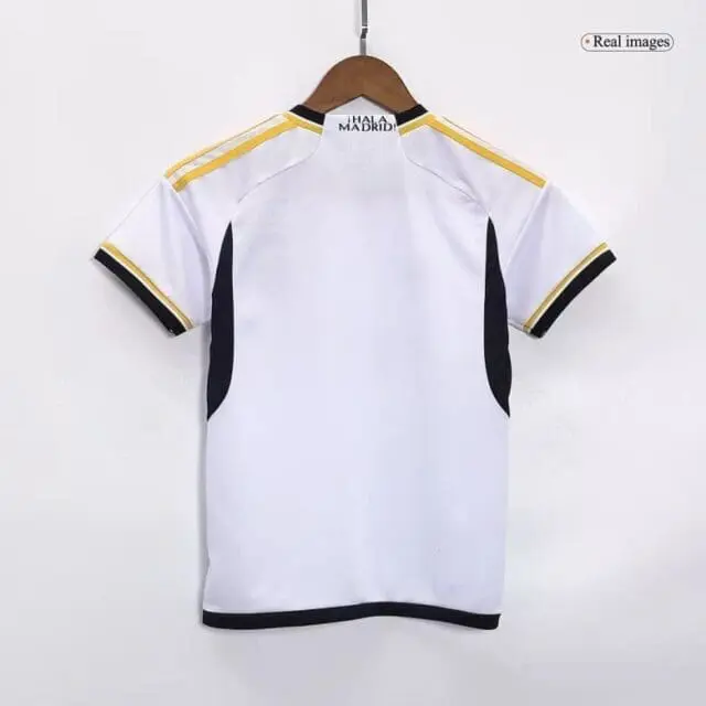 a white and black shirt on a swinger