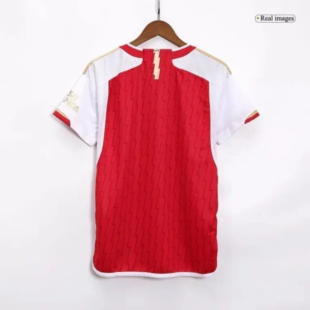a red and white jersey on a swinger