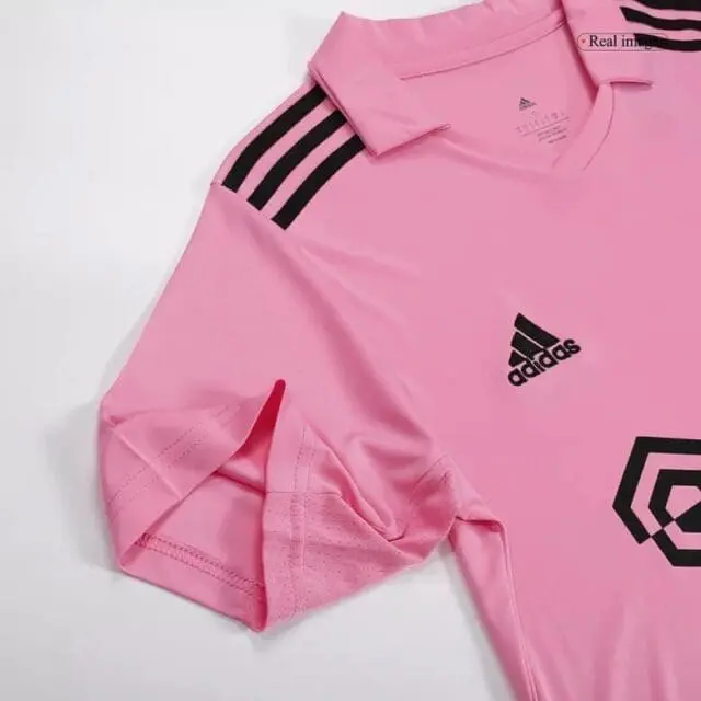 a pink shirt with black stripes