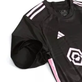 a black and pink sports jersey