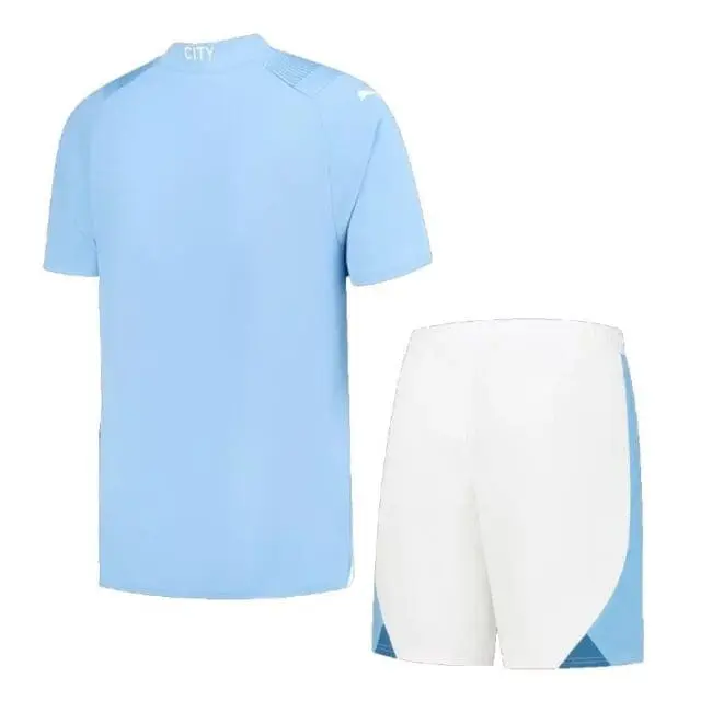 a blue shirt and white shorts