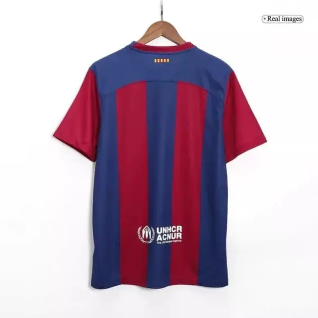 a red and blue striped shirt on a swinger