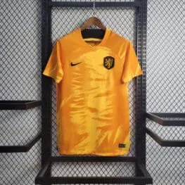 a yellow shirt on a rack