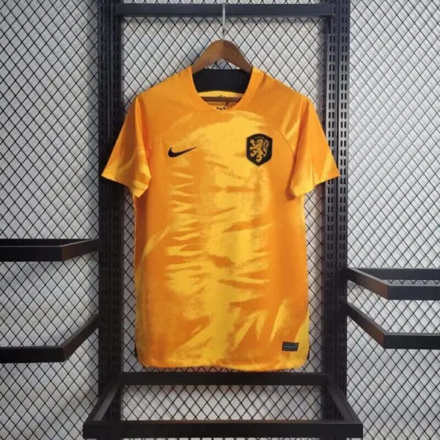 a yellow shirt on a rack