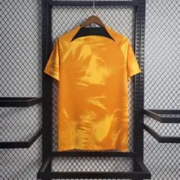 a yellow shirt on a swinger