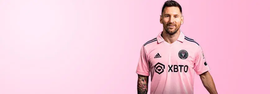 a man in a pink shirt