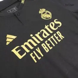 a black shirt with gold text