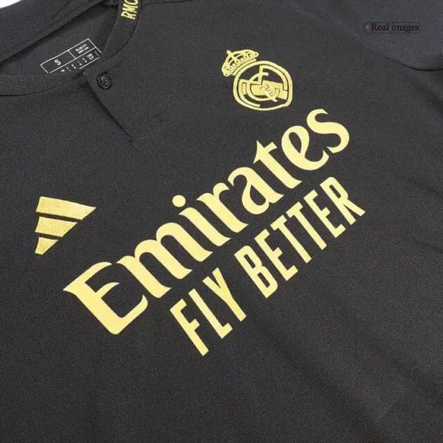 a black shirt with gold text