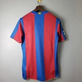 a red and blue striped shirt on a swinger