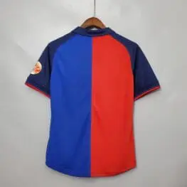 a red and blue shirt on a swinger