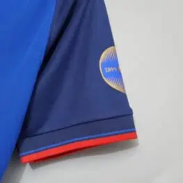 a close up of a blue and red shirt