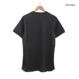 a black shirt on a swinger