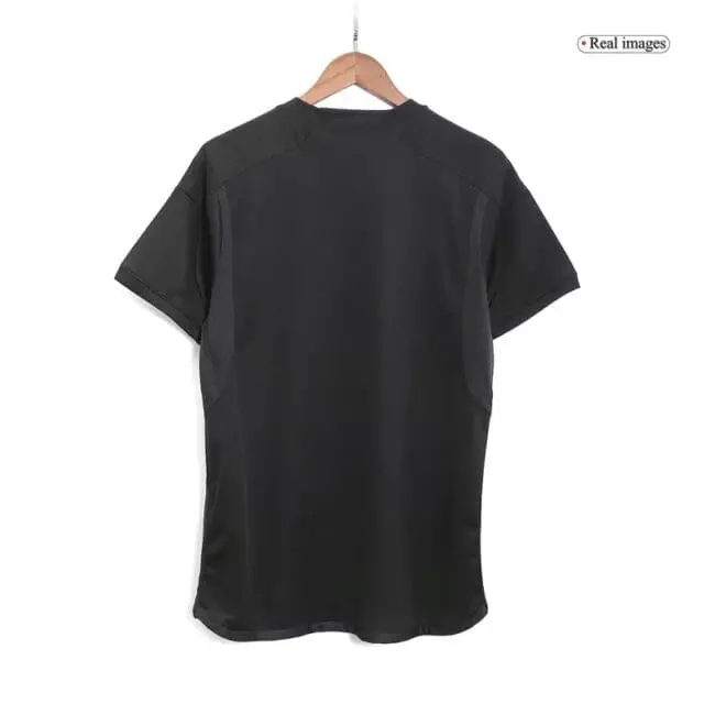 a black shirt on a swinger
