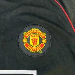 a close up of a black jersey