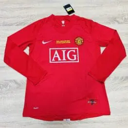 a red shirt on a wooden surface