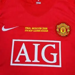 a red shirt with a logo