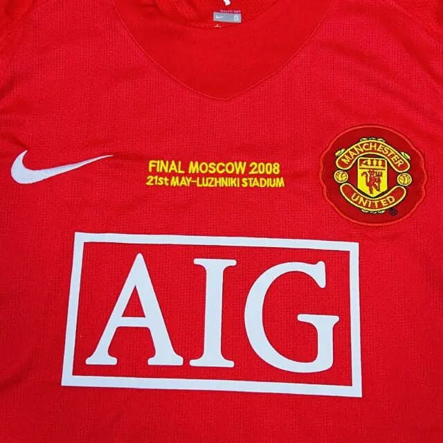 a red shirt with a logo