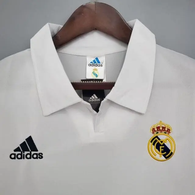a white shirt with a logo on it