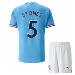 Детская футбольная форма Стоунз Манчестер Сити 2023 года