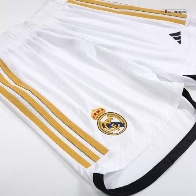 a white shorts with yellow stripes