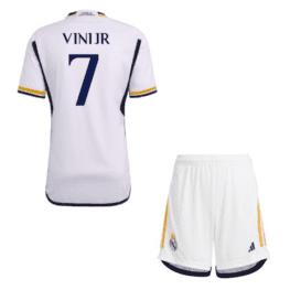 a white sports uniform with blue text and a white shorts