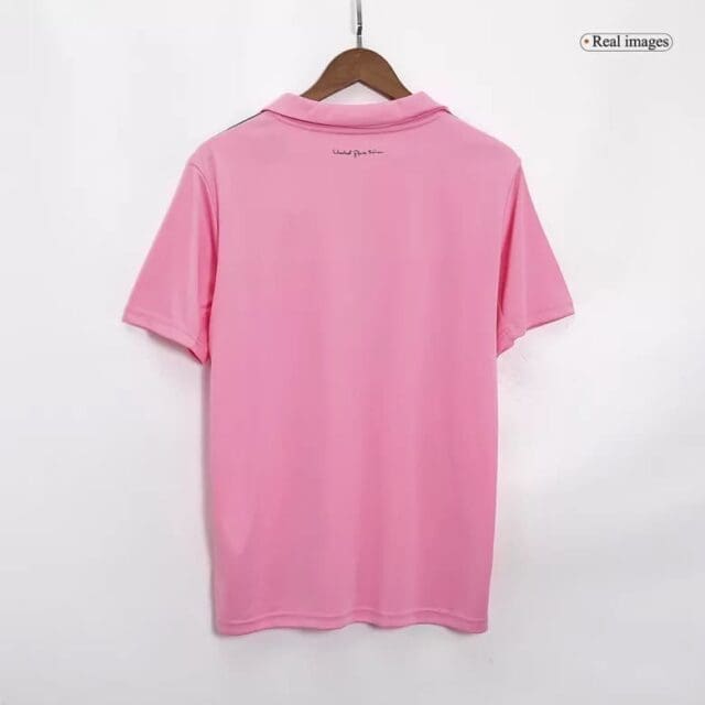 a pink shirt on a swinger