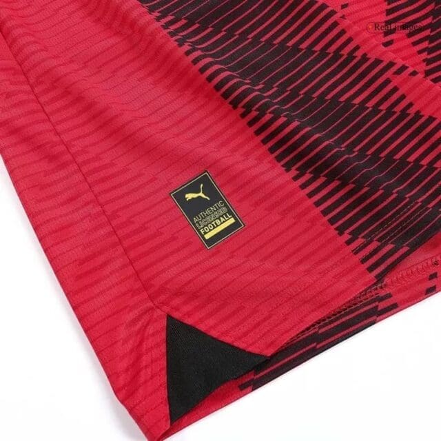 a close up of a red and black shorts