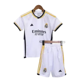 a white football uniform and shorts