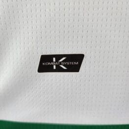 a close up of a white jersey