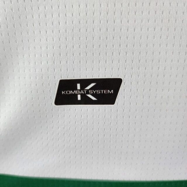 a close up of a white jersey