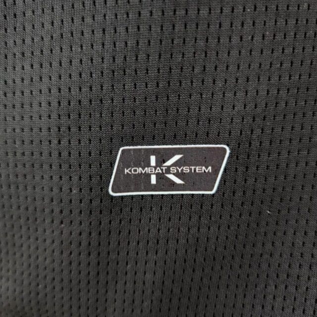 a black fabric with a white logo