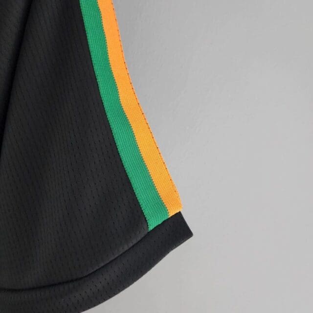 a close up of a black jersey