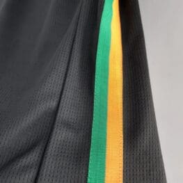 a close up of a black jersey