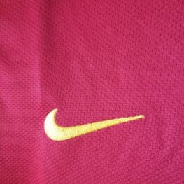 a close up of a red jersey