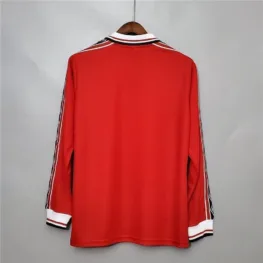 a red shirt with white stripes on a swinger