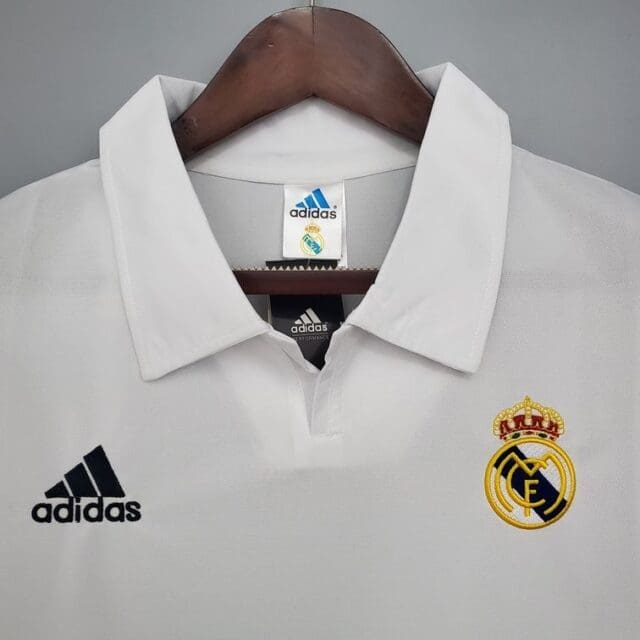 a white shirt with a logo on it