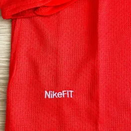 a red fabric with white text on it